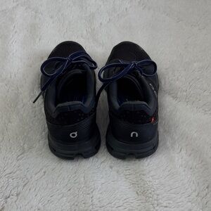On Running Men's Dark Athletic Shoes with Blue Accents